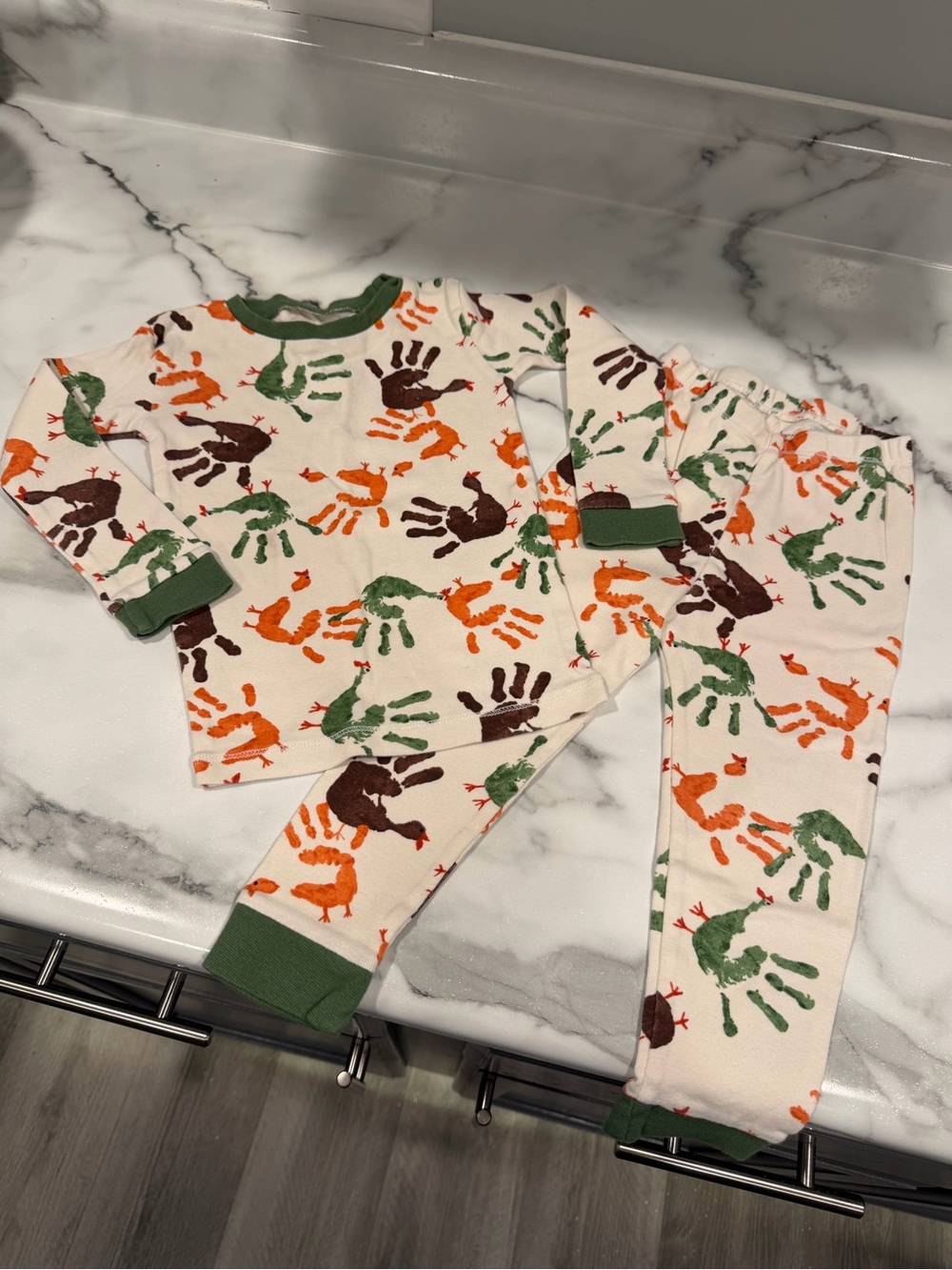 Burt's Bees Cream Pajama Set with Green, Orange & Brown Handprints
